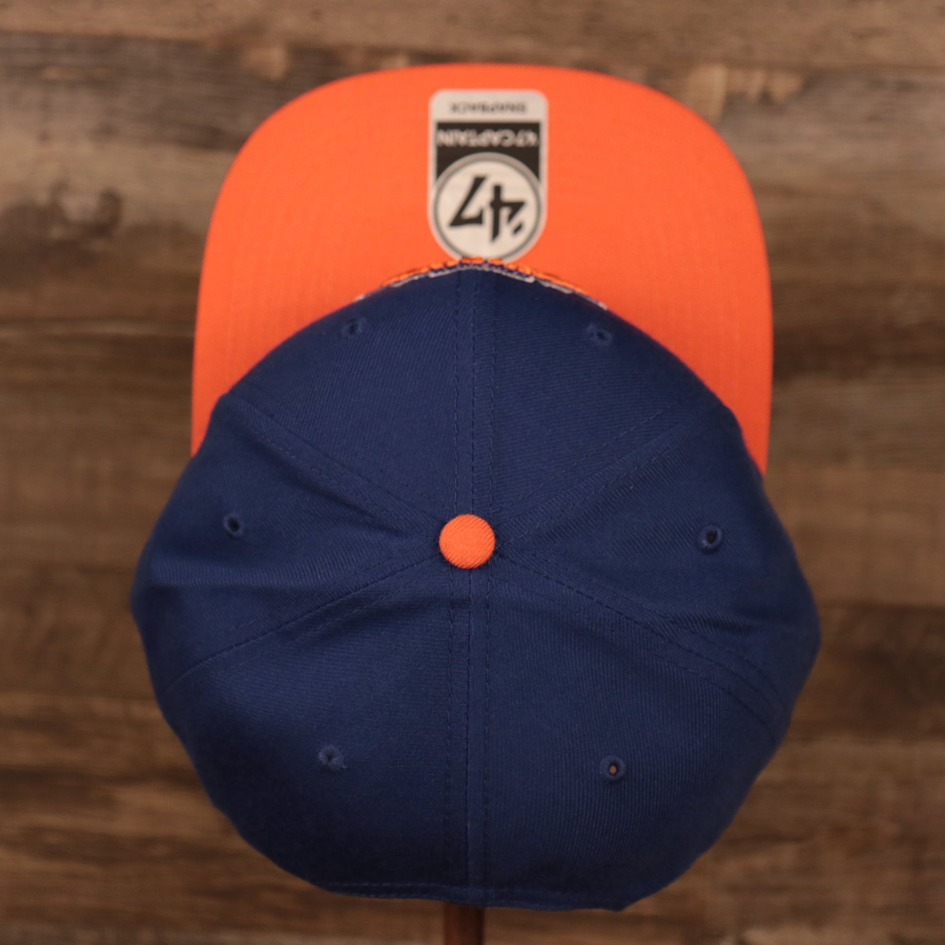 top view of the New York Knicks Royal Blue and Orange Adjustable Grey Bottom Snapback Hat