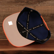 under visor on the New York Knicks Royal Blue and Orange Adjustable Grey Bottom Snapback Hat