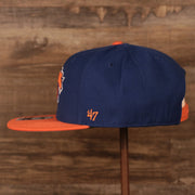 wearers left side of the New York Knicks Royal Blue and Orange Adjustable Grey Bottom Snapback Hat