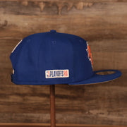 Embroidered on the wearer's right side of the New York Knicks 2021 NBA Playoffs snapback hat is the NBA 2021 Playoffs Side Patch