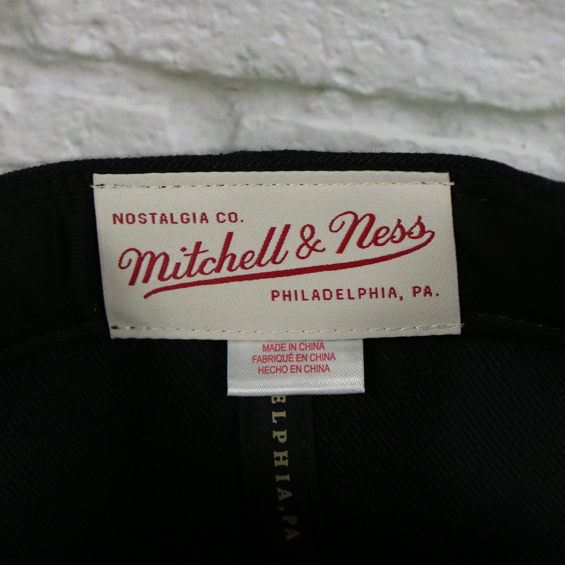 mitchell and ness label on the Brooklyn Nets Vintage Retro NBA Team Ground 2.0 Mitchell and Ness Snapback Hat | Black