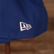 A close up shot of the New Era logo embroidered on the New York Knicks 2021 NBA Playoffs snapback hat