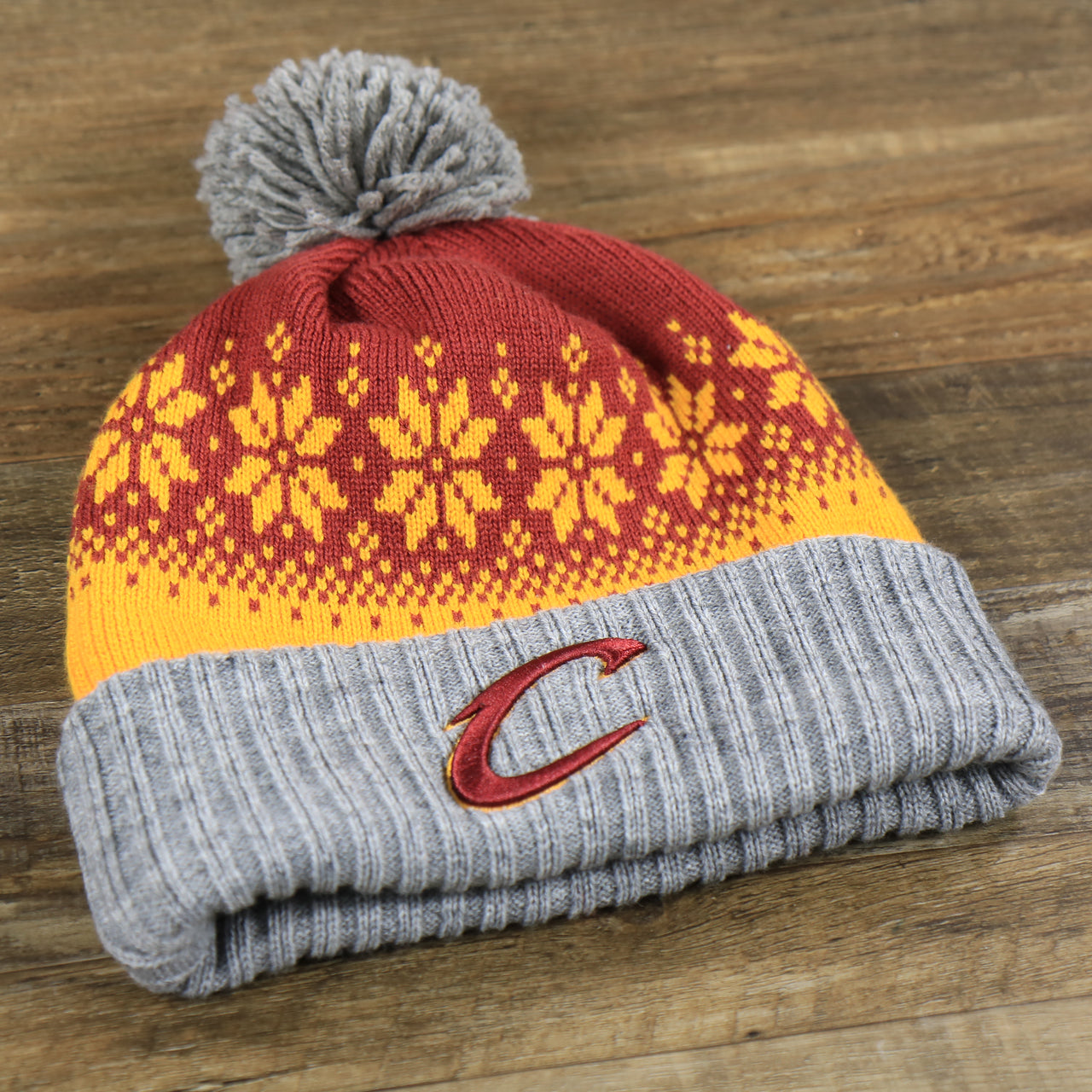 Cleveland Cavaliers Arctic Snowflake Ugly Sweater Pattern Cuffed Beanie With Pom Pom | Yellow, Maroon, and Gray Winter Beanie