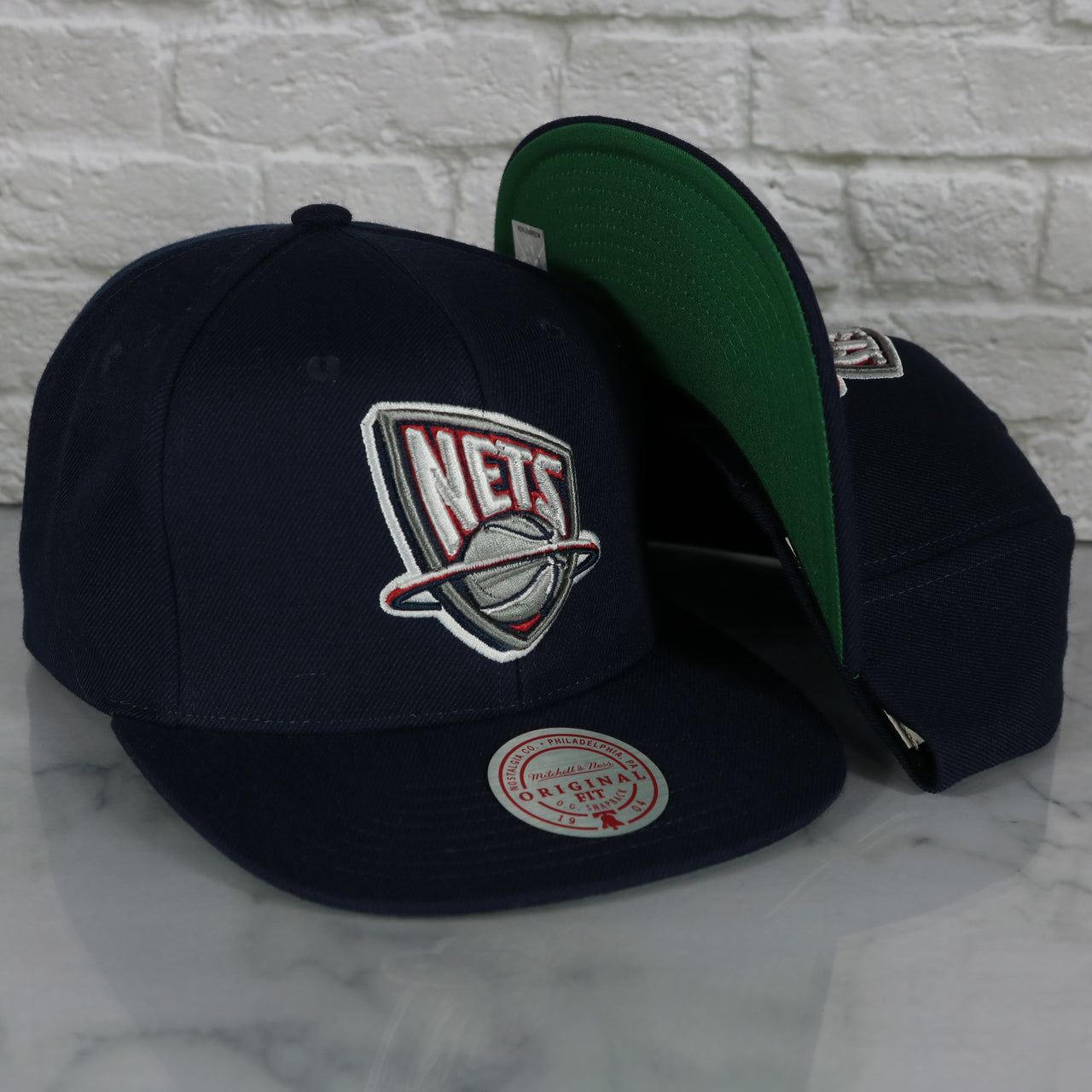 New Jersey Nets Vintage Retro NBA Team Ground 2.0 Mitchell and Ness Snapback Hat | Navy Blue