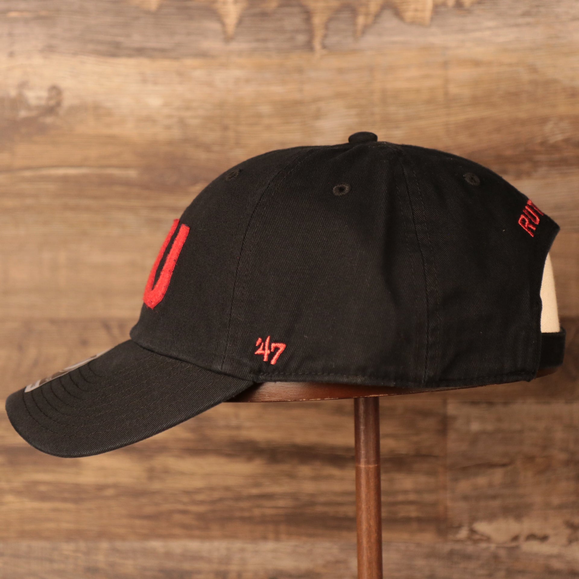 wearers left of the Rutgers University Throwback Black Adjustable Dad Hat