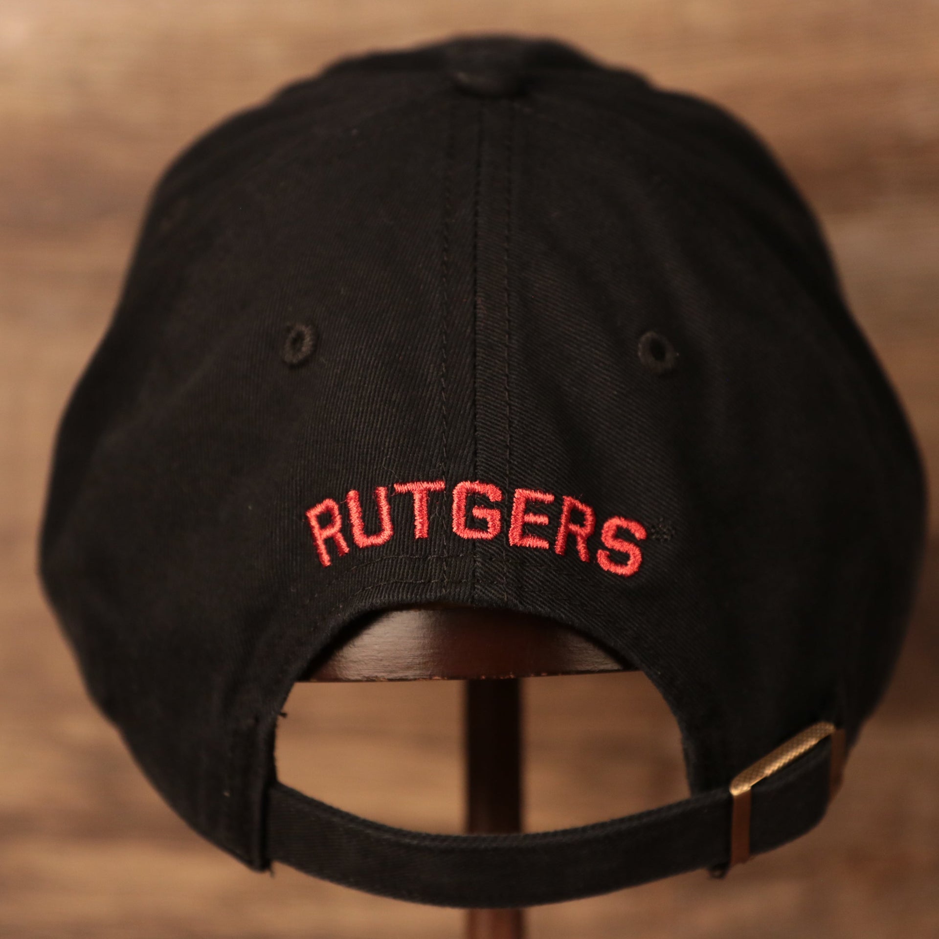 back of the Rutgers University Throwback Black Adjustable Dad Hat