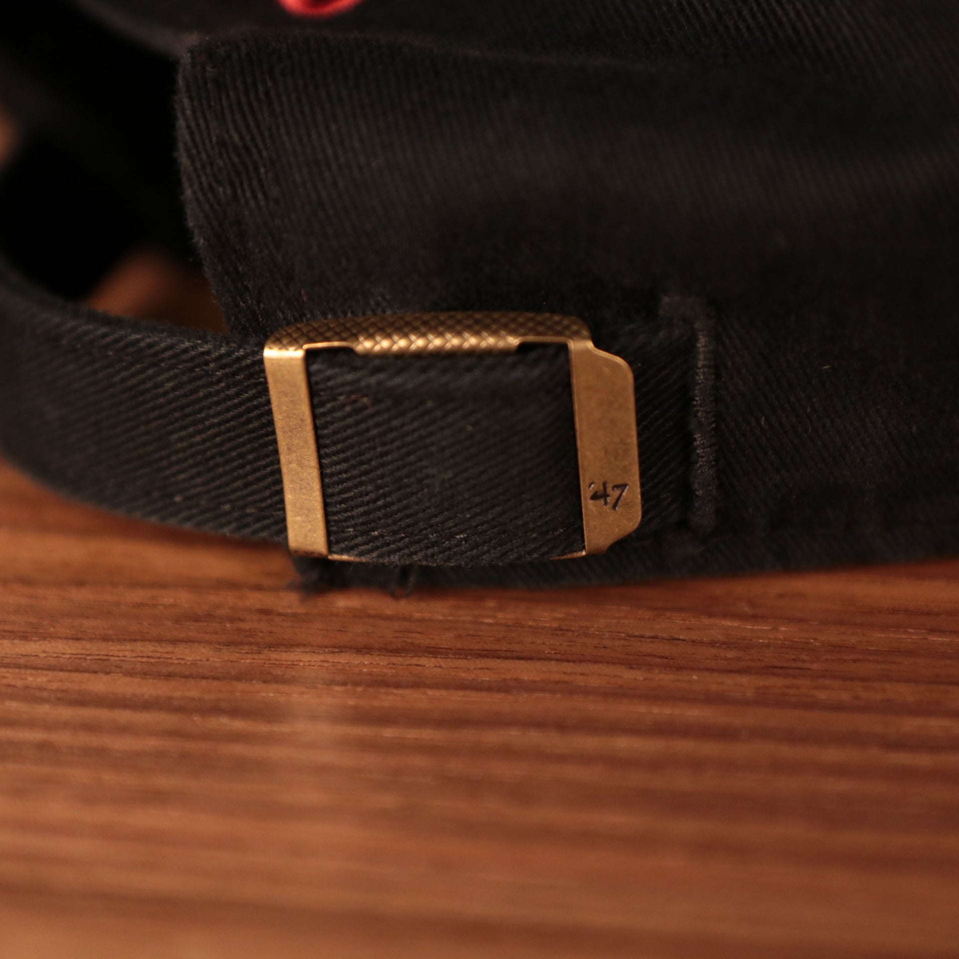adjustable strap on the back of the Rutgers University Throwback Black Adjustable Dad Hat