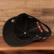 underside of the Rutgers University Throwback Black Adjustable Dad Hat
