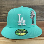 Front of the 50th Anniversary Los Angeles Dodgers Palm Tree Pink Bottom Side Patch 5950 Fitted | "Mint Flamingo"
