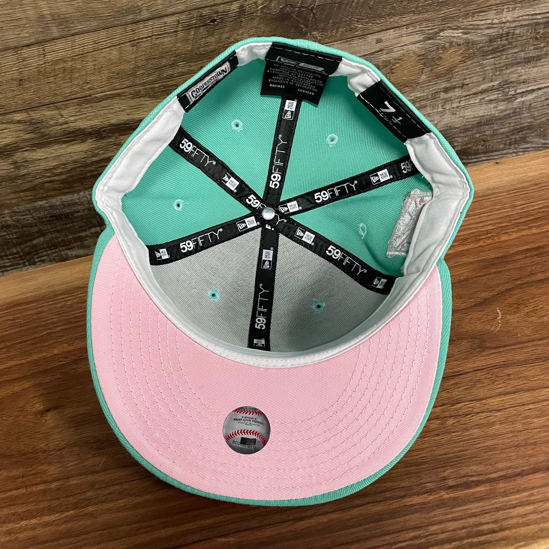 Pink under visor of the 50th Anniversary Los Angeles Dodgers Palm Tree Pink Bottom Side Patch 5950 Fitted | "Mint Flamingo"