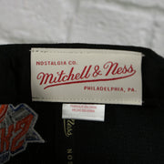 mitchell and ness label on the New York Knicks Vintage Retro NBA Team Script 2.0 Mitchell and Ness Snapback Hat | Black