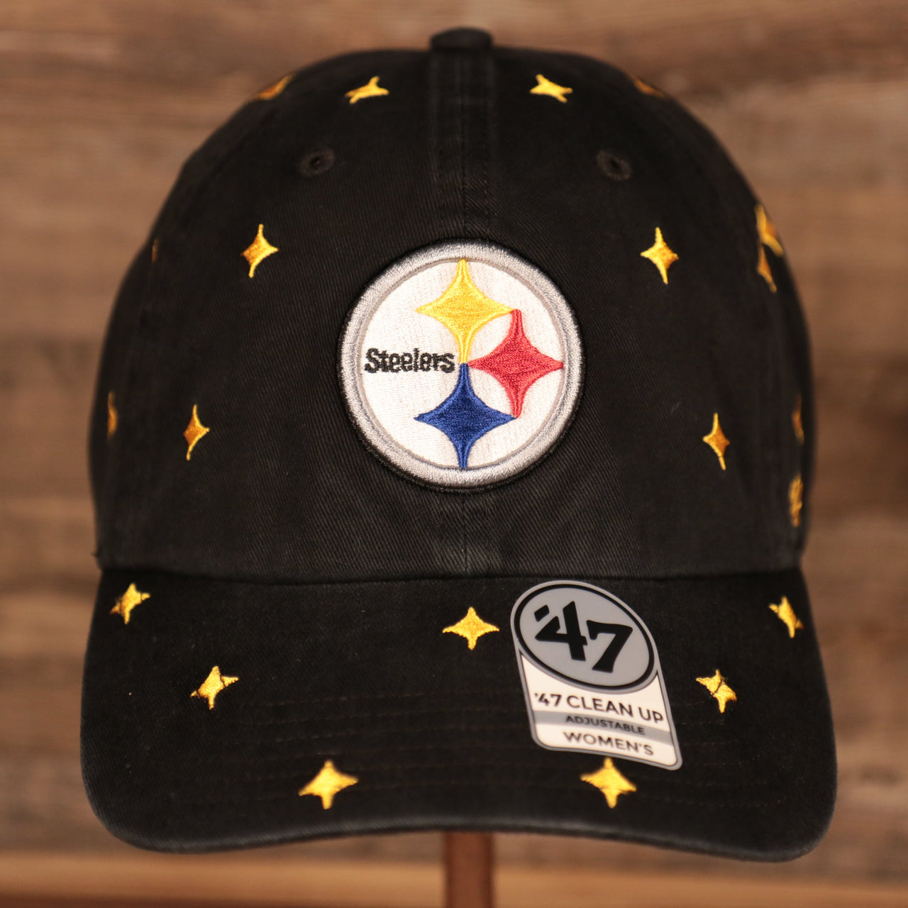 front of the Pittsburgh Steelers All Over Logo Patch Black Adjustable Dad Hat