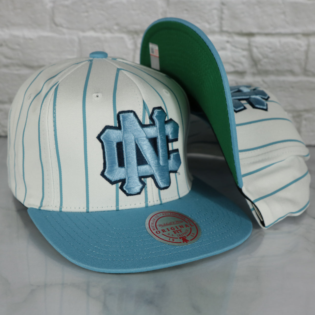 University of North Carolina Tar Heels Vintage Pinstripe Baseball Hat | Retro Mitchell and Ness White Pinstripe Snapback Hat