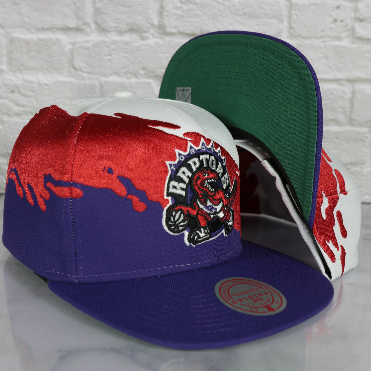Toronto Raptors Vintage Retro NBA Paintbrush Mitchell and Ness Snapback Hat | Purple/White/Red