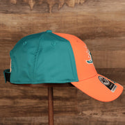 wearers right side of the Miami Dolphins Orange and Teal Adjustable Dad Hat