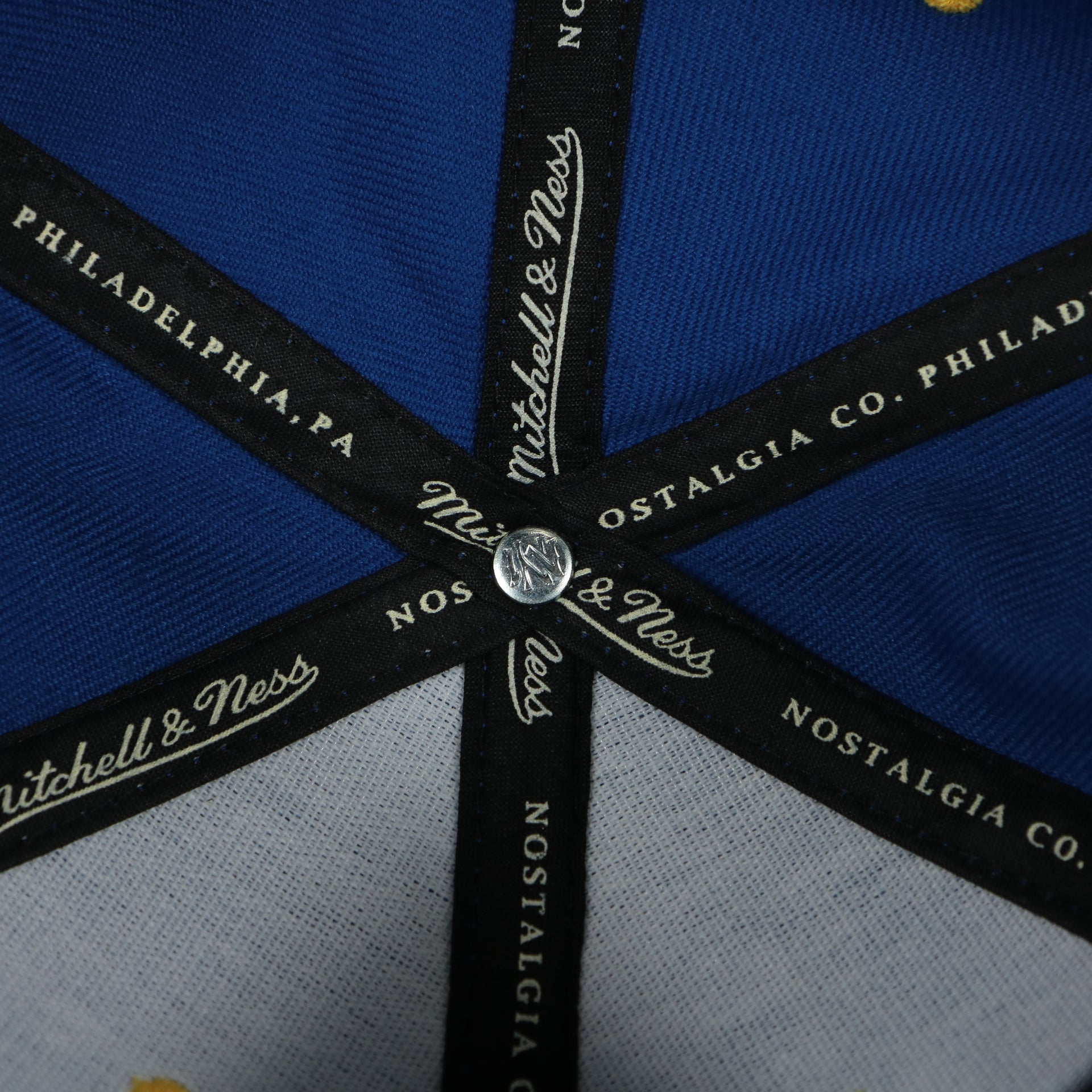 mitchell and ness taping on the Indiana Pacers Throwback Logo Two tone Gray Bottom Cap | Royal Blue/Gray Snapback hat