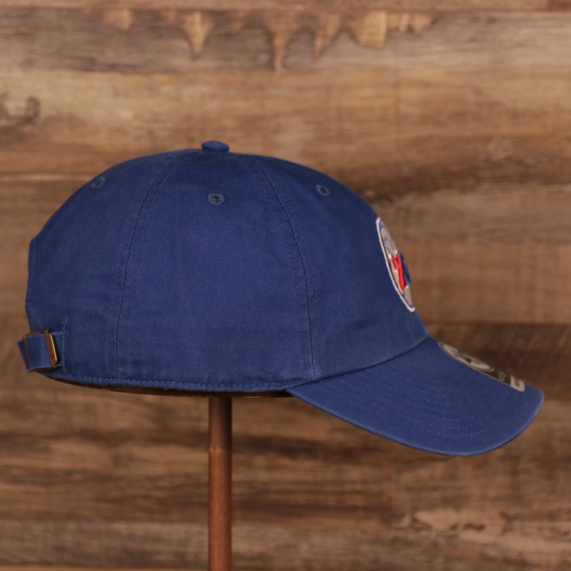 wearers right side of the Philadelphia 76ers Blue Adjustable Dad Hat