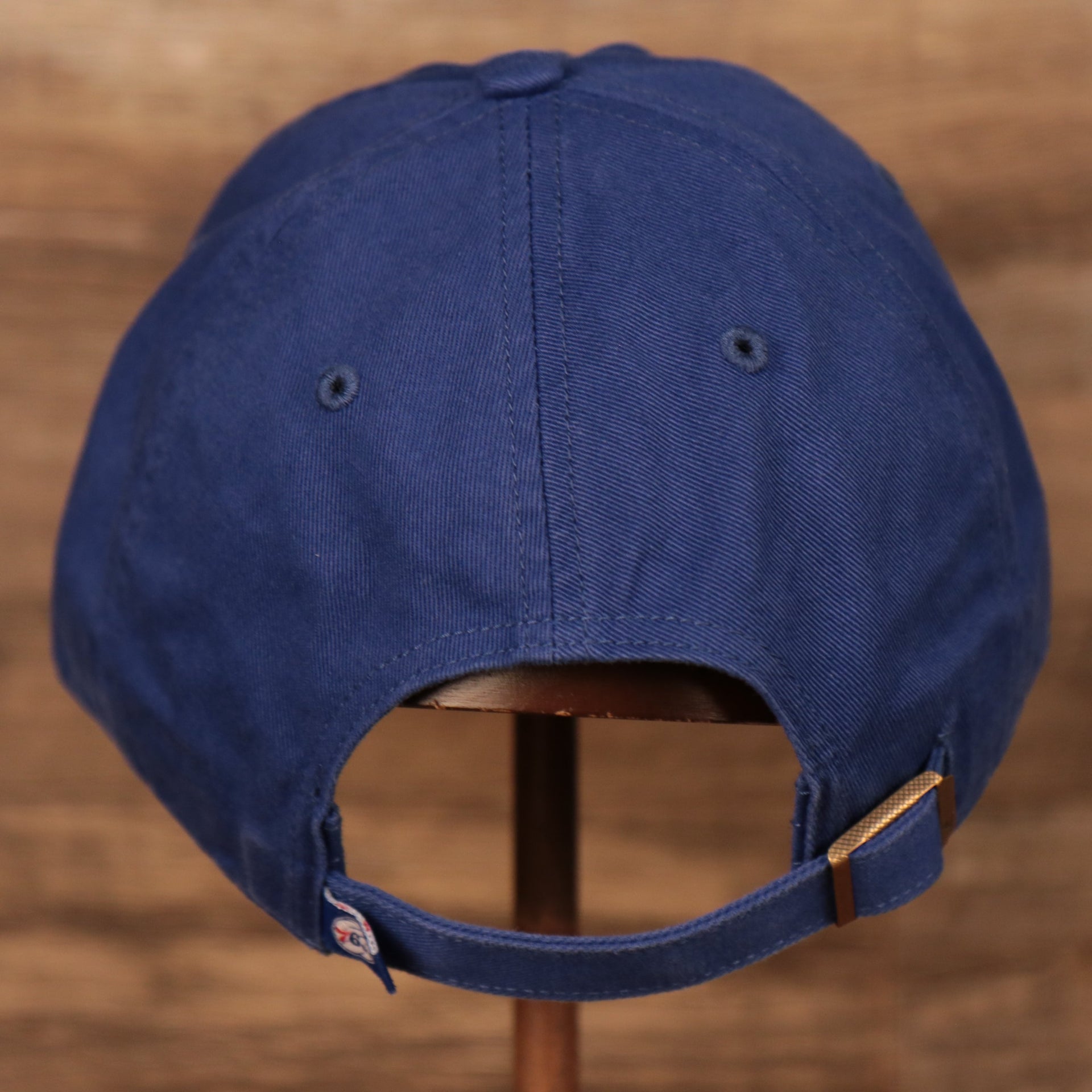 back side of the Philadelphia 76ers Blue Adjustable Dad Hat