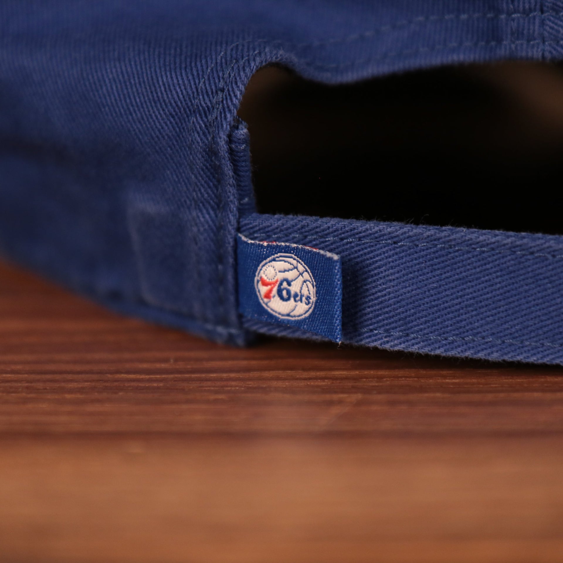 76ers tag on the back of the Philadelphia 76ers Blue Adjustable Dad Hat