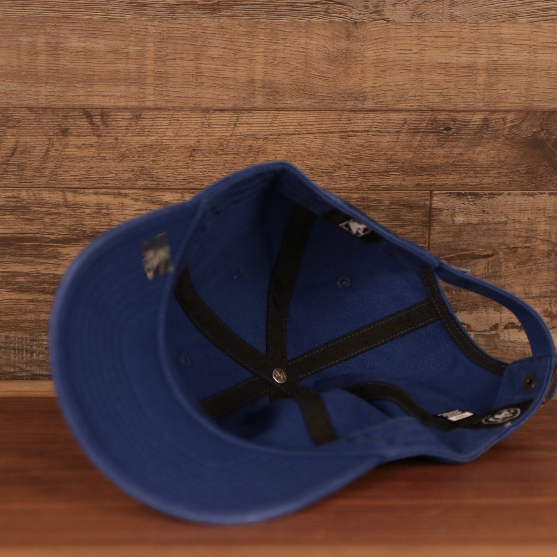 underisde of the Philadelphia 76ers Blue Adjustable Dad Hat