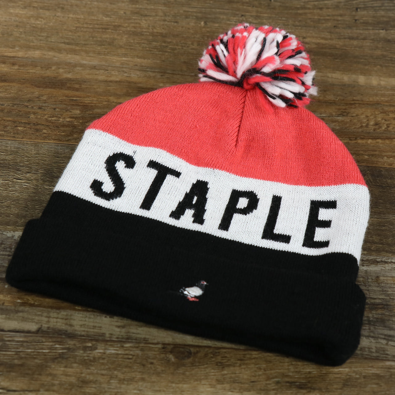 Staple Pigeon Logo Striped Wordmark Cuffed Pom Pom Winter Beanie | Red, White, And Black Beanie