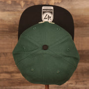 top view of the Milwaukee Bucks Dark Green and Black Adjustable Grey Bottom Snapback Hat