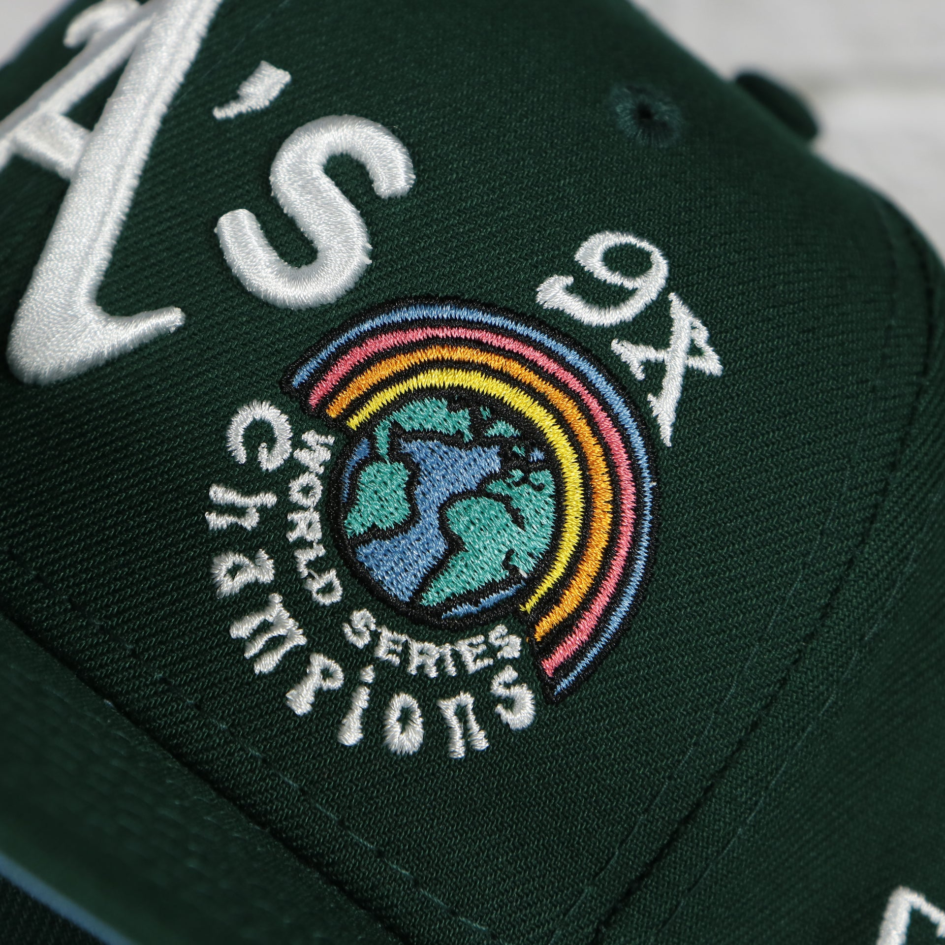 9x world series champions patch on the Oakland Athletics Groovy World Series Champions Patch 59Fifty Fitted Cap | New Era Groovy Side Patch 5950