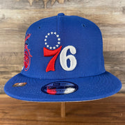 Front of the Philadelphia 76ers NBA 75th Anniversary Side Patch Gray Bottom Royal 9Fifty Snapback Hat | Back Half