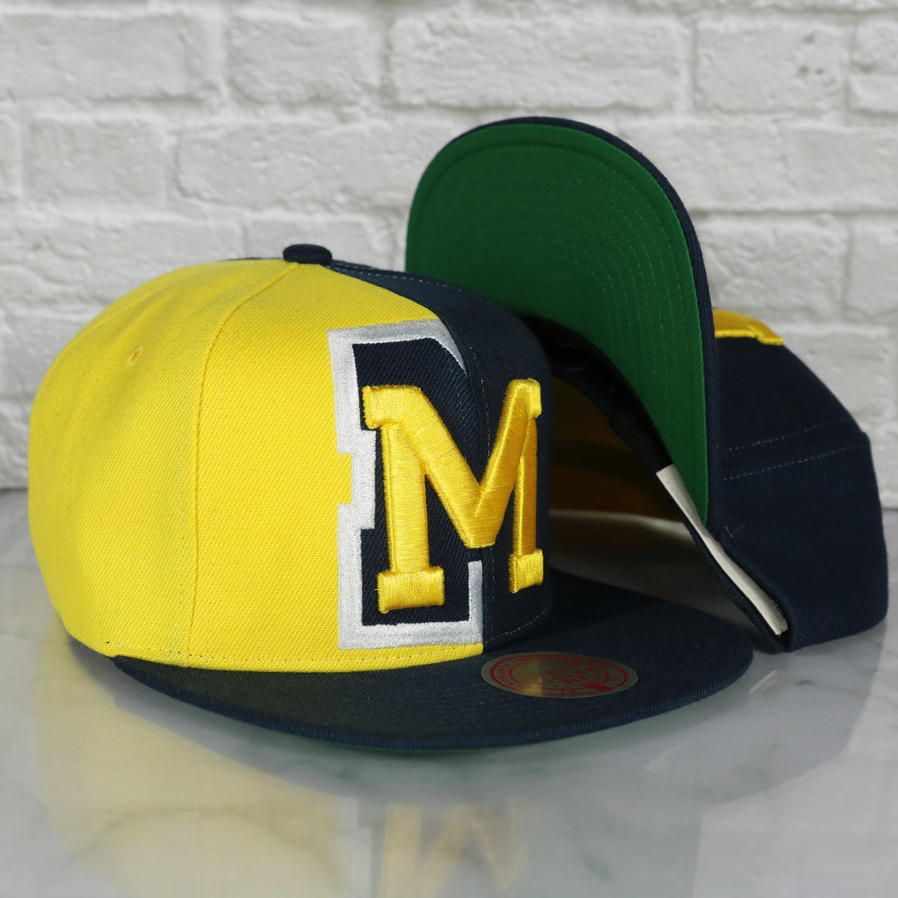 University of Michigan Wolverines Retroline Logo Outline Vintage Snapback Hat | Mitchell and Ness Wolverines Snap Cap