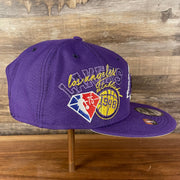 Wearer's right of the Los Angeles Lakers NBA 75th Anniversary Side Patch Gray Bottom Purple 9Fifty Snapback Hat | Back Half