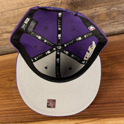 Gray under visor of the Los Angeles Lakers NBA 75th Anniversary Side Patch Gray Bottom Purple 9Fifty Snapback Hat | Back Half