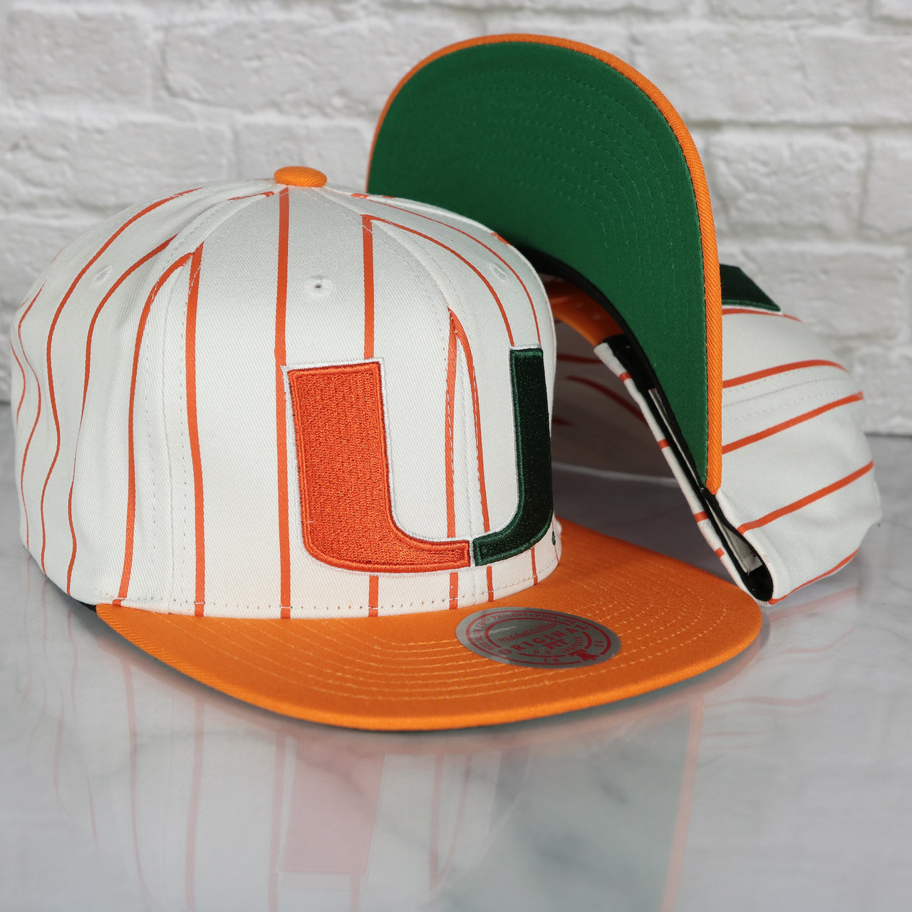 University of Miami Hurricanes Vintage Pinstripe Baseball Hat | Retro Mitchell and Ness White Pinstripe Snapback Hat