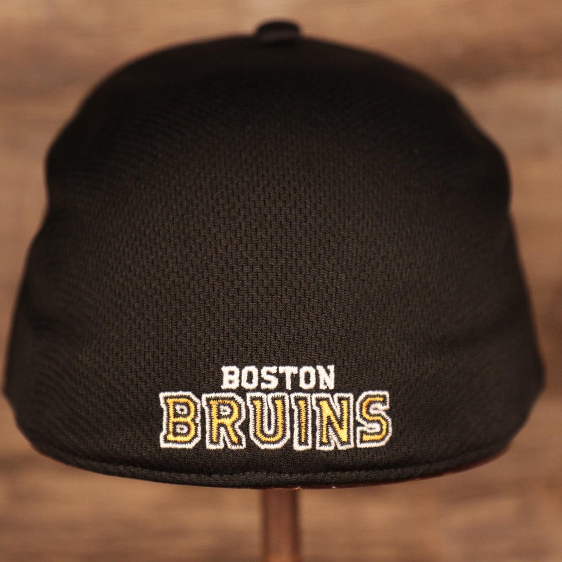 back side of the Boston Bruins Black & Yellow Stretch Fit Dad Hat