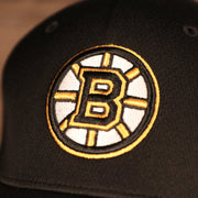 logo shot on the Boston Bruins Black & Yellow Stretch Fit Dad Hat
