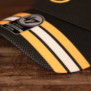 brim shot on the Boston Bruins Black & Yellow Stretch Fit Dad Hat