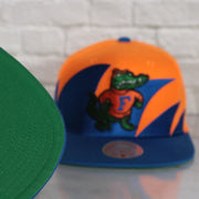green under visor on the University of Florida Gators Vintage Retro Sharktooth Mitchell and Ness Snapback Hat | Orange/Blue
