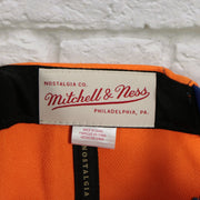 mitchell and ness label on the University of Florida Gators Vintage Retro Sharktooth Mitchell and Ness Snapback Hat | Orange/Blue