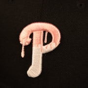 Close up of the drippy logo on the Philadelphia Phillies 2008 World Series Side Patch Drip Logo Pink Bottom 9Fifty Snapback Hat