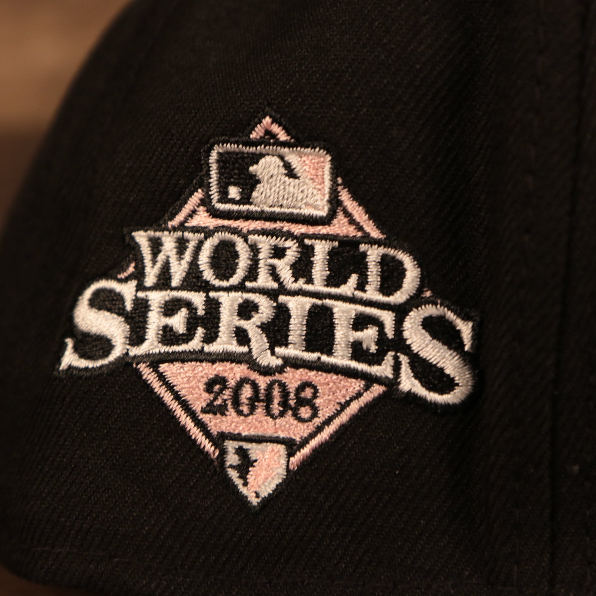 Close up of the 2008 World Series side patch on the Philadelphia Phillies 2008 World Series Side Patch Drip Logo Pink Bottom 9Fifty Snapback Hat