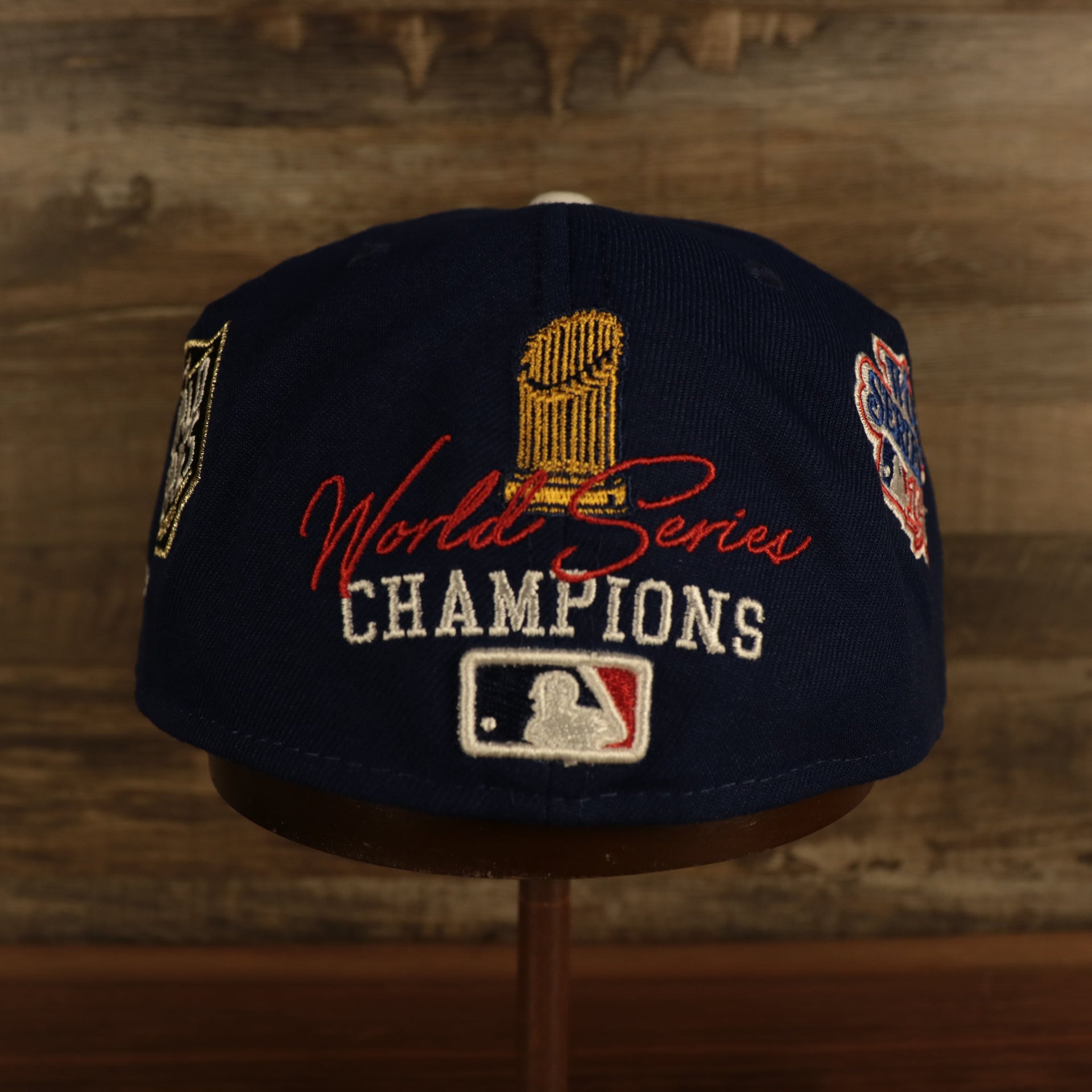 back side of the Los Angeles Dodgers Cooperstown "Championship Rings" All Over Side Patch Gray Bottom 59FIFTY Fitted Cap