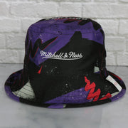 mitchell and ness logo on the Toronto Raptors 90s Inspired NBA Hyper Mitchell and Ness Reversible Bucket Hat