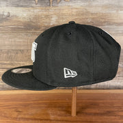 Wearer's left of Brooklyn Nets NBA 75th Anniversary 2012 Side Patch Gray Bottom Black 9Fifty Snapback Hat | City Edition