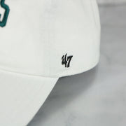 '47 brand logo close up on the Philadelphia Eagles 2023 NFC Conference Champions Locker Room White Dad Hat
