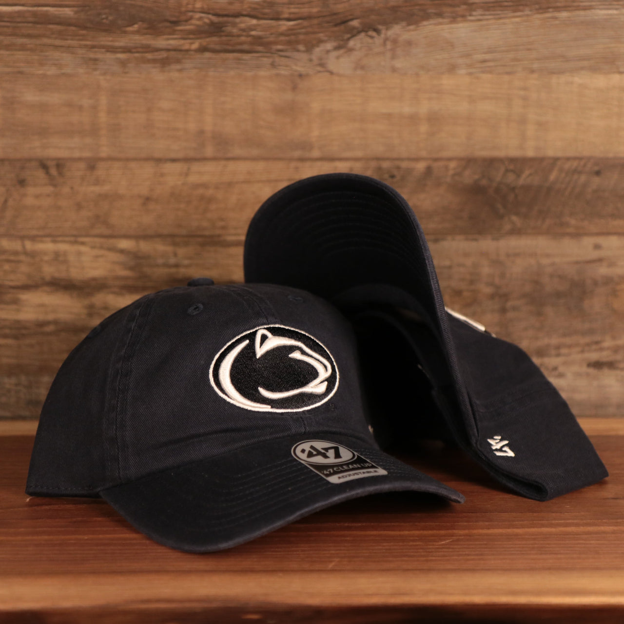 front and bottom of the Penn State Nittany Lions Navy Adjustable Dad Hat