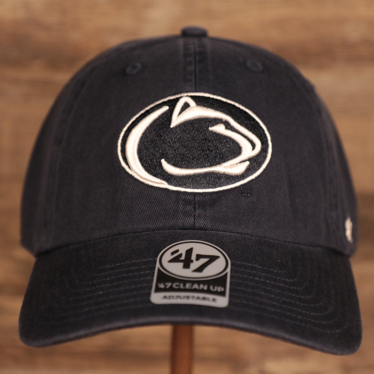 front of the Penn State Nittany Lions Navy Adjustable Dad Hat