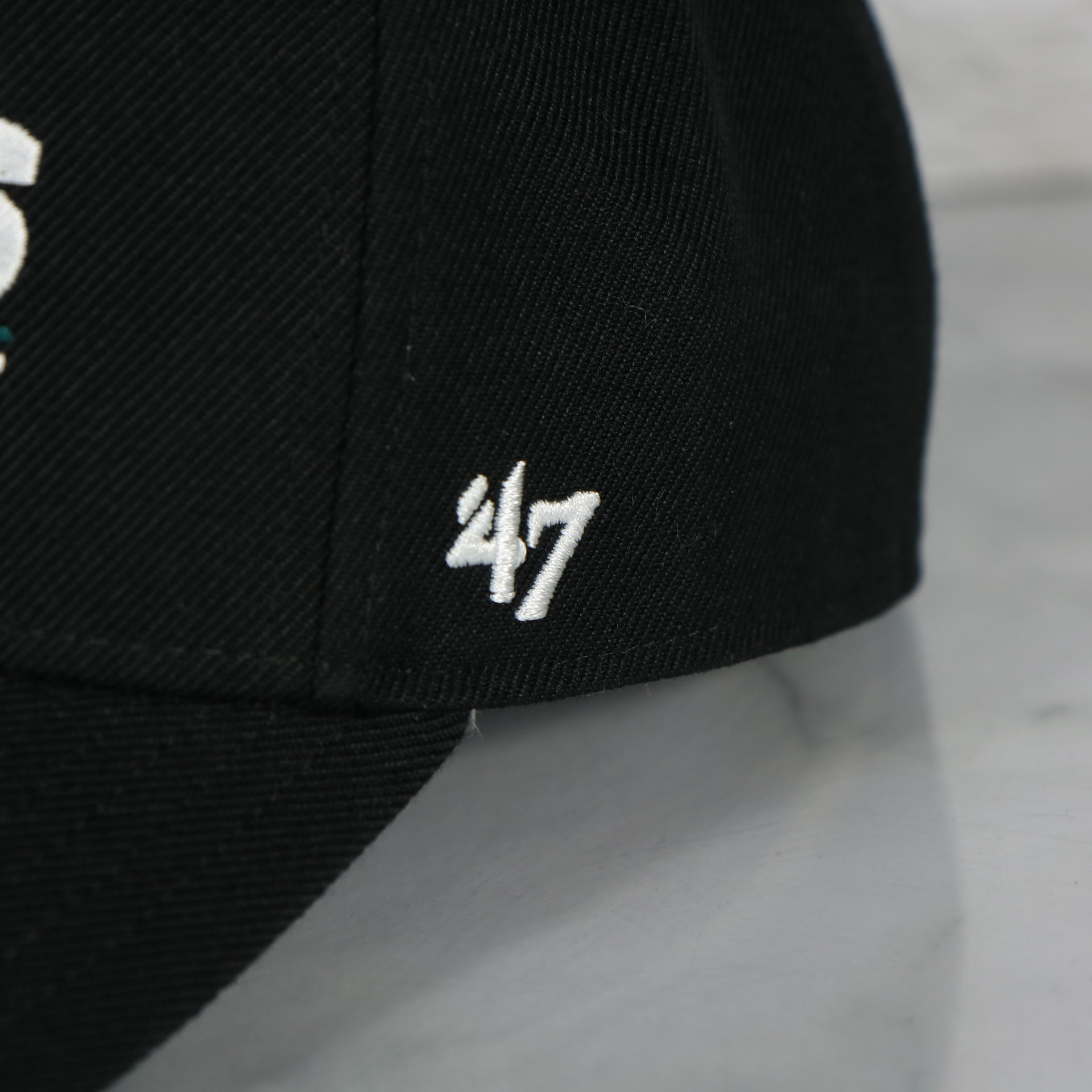 Close up of the '47 brand logo on the Philadelphia Eagles 2023 NFC Conference Champions Locker Room Black MVP Dad Hat