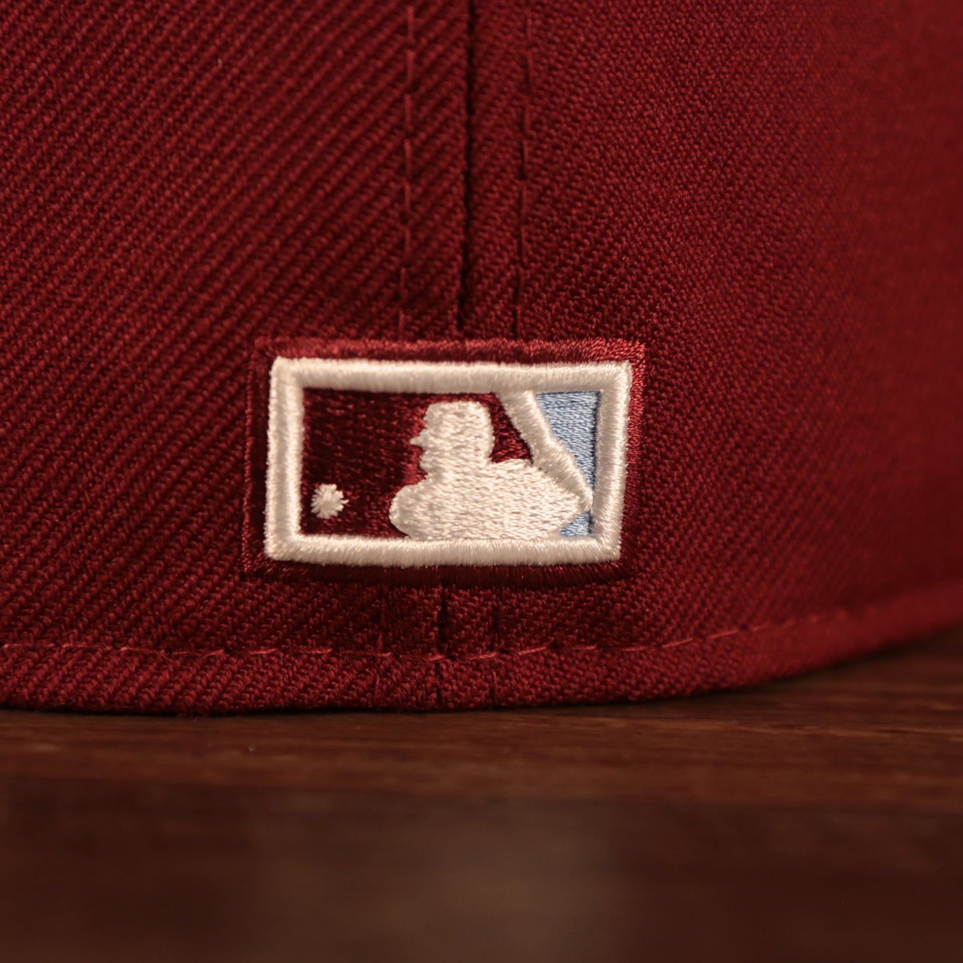 Close up of the Cooperstown MLB Batterman logo on the Philadelphia Phillies Cooperstown Upside Down Logo Gray Bottom 59Fifty Fitted Cap