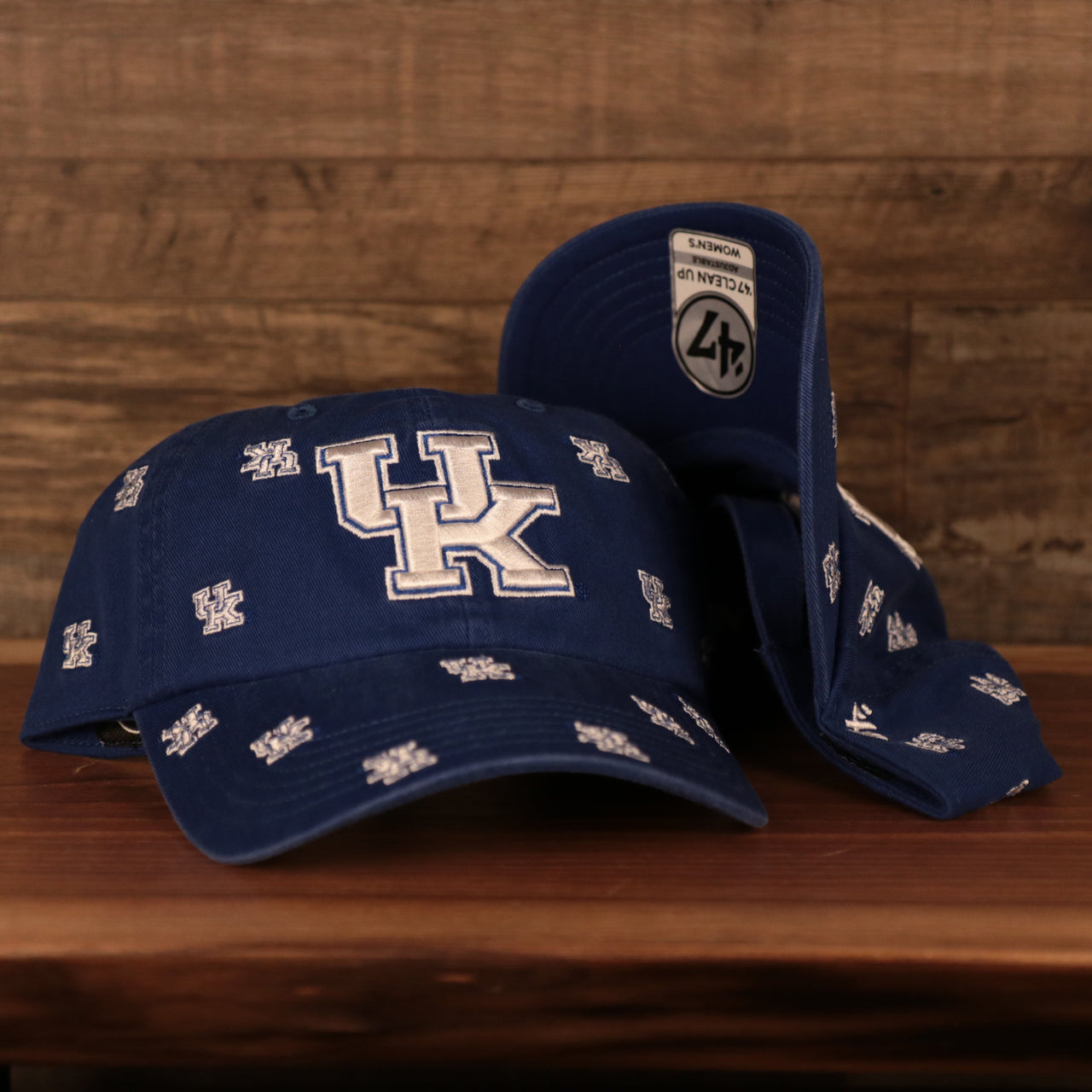 front and bottom of the University of Kentucky Wildcats All Over Logo Patch Blue Adjustable Dad Hat