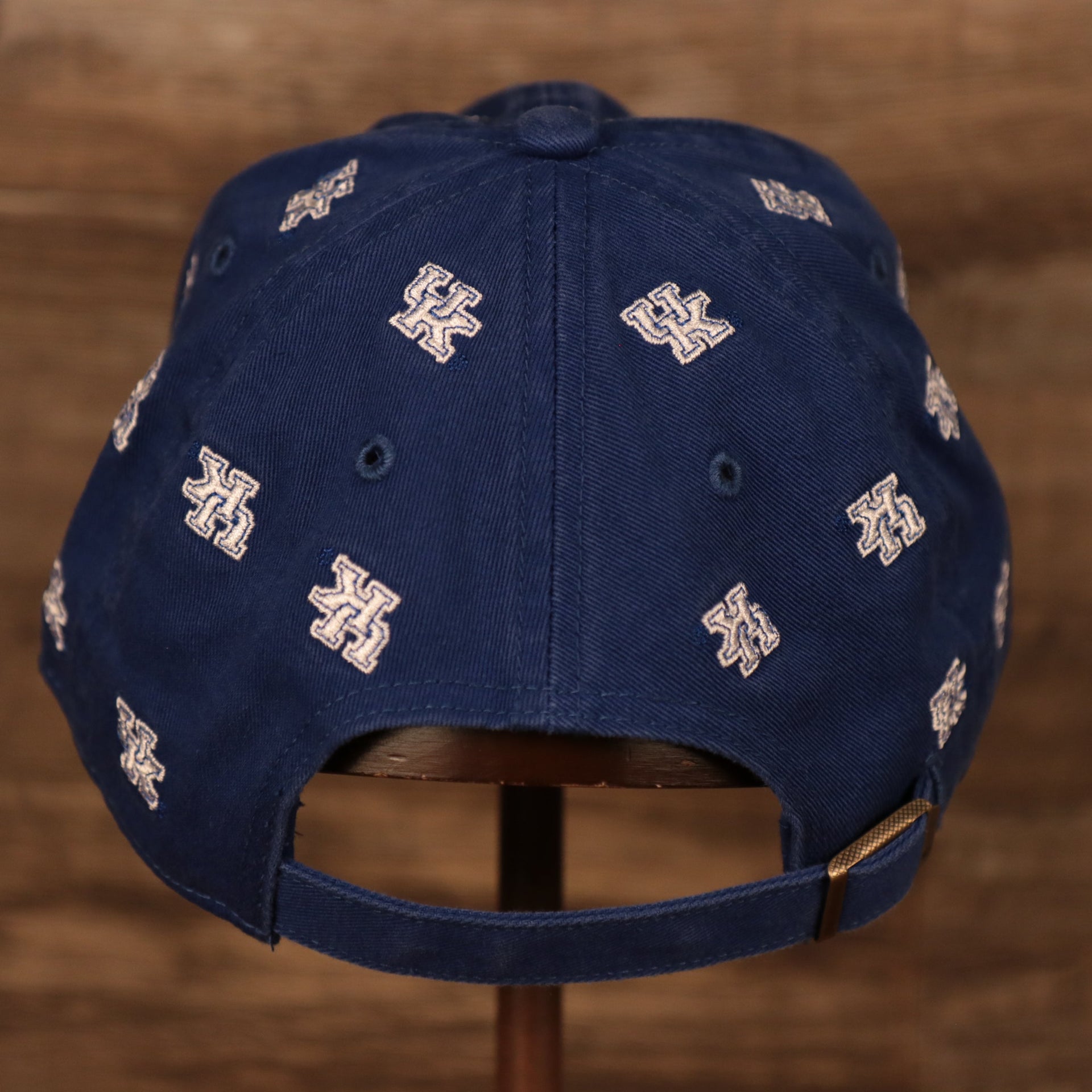 back side of the University of Kentucky Wildcats All Over Logo Patch Blue Adjustable Dad Hat