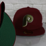 green under visor on the Philadelphia Phillies Cooperstown 100th Anniversary Side Patch Green Bottom 59Fifty Maroon Fitted Cap | Botanical Pack